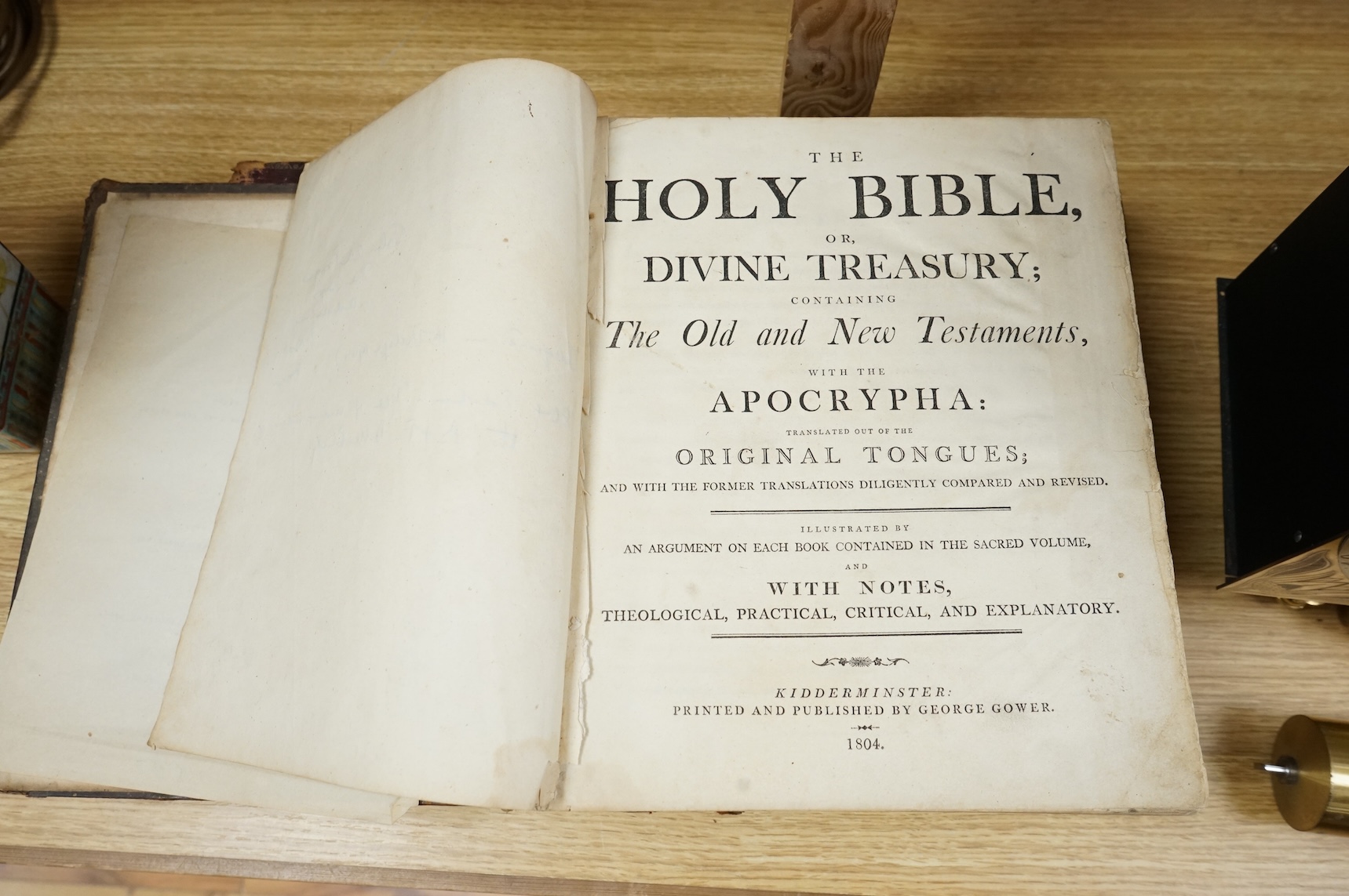 The Holy Bible, or, Divine Treasury ... with the Apocrypha ... and with notes ... contemp. calf (distressed), folio. Kidderminster: printed and published by George Gower, 1804; The Holy Bible, with a Complete Commentary